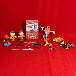 Photo of CRACKER JACK CONTAINER, CHARLIE BROWN FIGURES, DONNY DOMINO, YOGI BEAR ARBYS KID