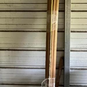Photo of Wood trim Brass curtain rod Wood tool handle