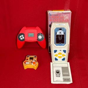 Photo of TANDY ELECTRONIC TRICK SHOT BASKETBALL GAME, ESPN HANDHELD GAME AND RACING HANDH