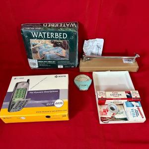 Photo of KYOCERA SMARTPHONE, SHOWER GRAB BARS, SHEETS, FIRST AID KIT AND MORE