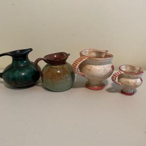 Photo of Assorted Pottery Small Pitchers