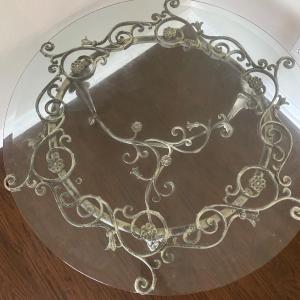 Photo of Wrought iron fence table