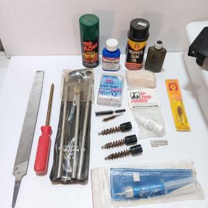 Photo of Firearm cleaning items - oils - files - brushes - cleaning rod and more