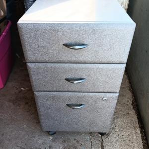 Photo of Three drawer filing cabinet on wheels