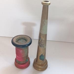 Photo of Two large brass firehose tips Fireman nozzles