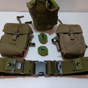 Photo of US Military issued ammunition bags - belt and canteen.