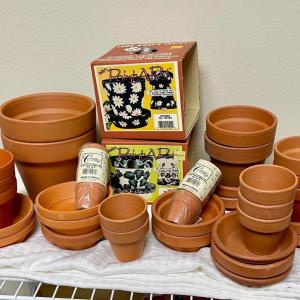 Photo of Terre Cotta pots, trays, and craft kits for pots