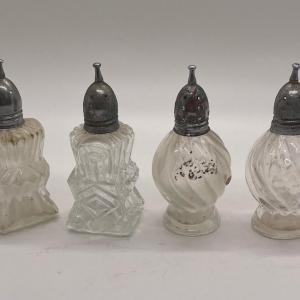 Photo of 4 Antique salt & pepper shakers with silver tops