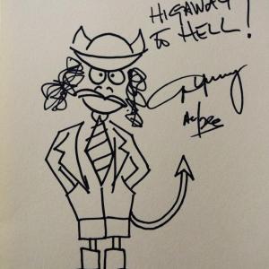 Photo of ACDC Angus Young hand drawn and signed sketch 