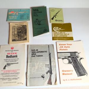 Photo of Variety of gun booklets - Ranger Handbook - Ruger - .45 Auto - NRA - M16A1 - AR-