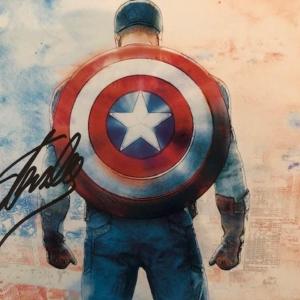 Photo of Stan Lee signed Captain America postcard
