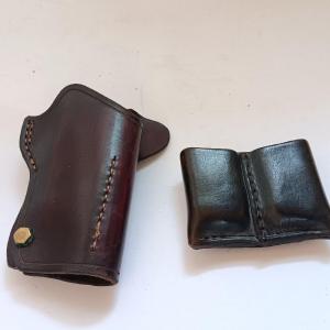 Photo of Leather pistol holster with leather magazine pouch