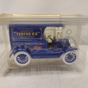 Photo of Case XX Antique Ford Delivery Truck Die Cast Coin Bank and Cutlery Set (#26)
