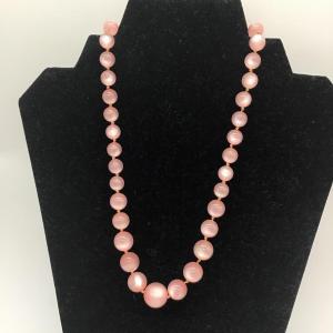 Photo of Vintage moon glow Pearl type light pink necklace