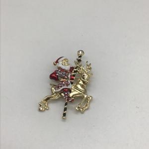 Photo of Santa and reindeer pin