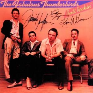 Photo of The Fabulous Thunderbirds signed "Butt Rockin" album