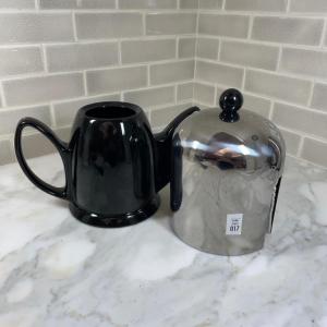 Photo of Teapot with cozy