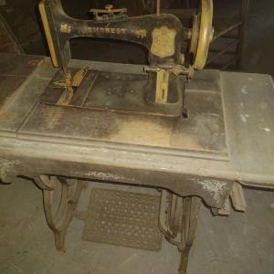 Photo of Antique Demorest Cast Body Treadle Sewing Machine with Wood Cabinet and Cast-Iro