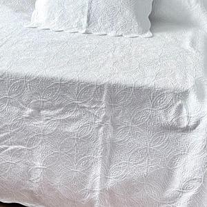 Photo of Queen Sized White Coverlet and 2 Shams