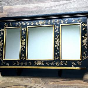 Photo of Beautiful Black Wall Mirror with Gold Floral Accent Detail
