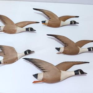 Photo of Wood carved Canadian geese wall hangings.