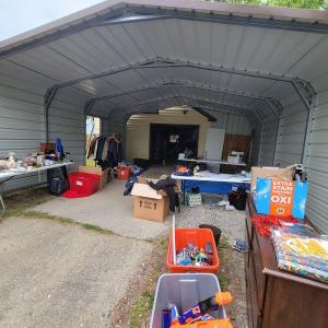 Photo of Lots of clothes and household items
