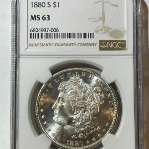 Photo of NGC CERTIFIED 1880-S NICE ORIGINAL MS63 GRADED MORGAN SILVER DOLLAR AS PICTURED.