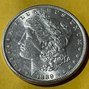 Photo of 1889-P NICE UNCIRCULATED MORGAN SILVER DOLLAR AS PICTURED.