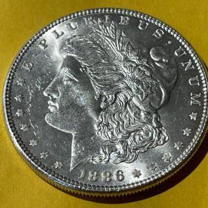 Photo of 1886-P NICE BRILLIANT UNCIRCULATED MORGAN SILVER DOLLAR AS PICTURED.