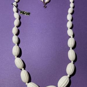 Photo of Vintage Genuine Lucite 30" Fashion Necklace in New w/Tag Condition.