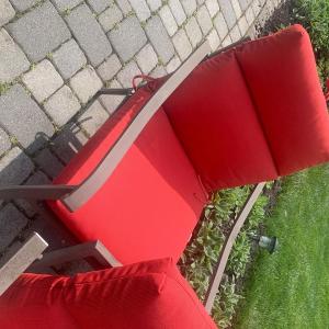 Photo of Two Patio Chairs.