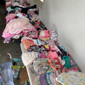 Photo of Garage Sale (lots of girls clothes)