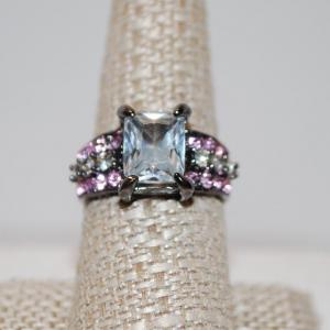 Photo of Size 9 Large Emerald Cut Stone with 22 Pink & Clear Accent Stone on a Black Tone
