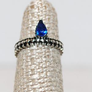 Photo of Size 6 Single Pear Shape Dark Blue Stone Ring on a Silver Tone Pointed Band (1.9