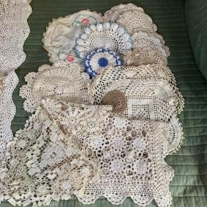 Photo of LOT 249: Crocheted Collection: Doilies & Tablecloth