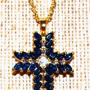 Photo of 30 Dark Blue Marquis Cut Stones Cross PENDANT (1" x ¾") on a Gold Tone Necklace