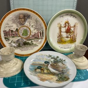 Photo of 3 plates and 2 candle holders