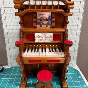 Photo of Vintage hand made piano and chair