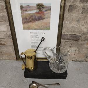 Photo of Block pitcher, art, salad servers and brass firestarter