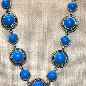 Photo of Eleven Ocean Blue Disc Stones Necklace on Silver Tone Chain 17" L
