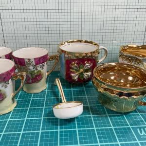 Photo of Antique gold trim cups and small ladle