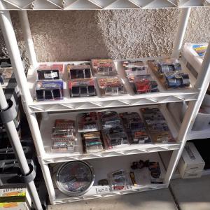 Photo of hot wheels and other diecast, yard art, tools, and whole lot more
