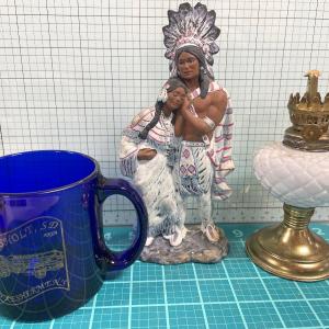 Photo of Native america figurine, mug and oil lamp