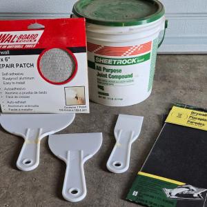 Photo of Joint Compound, Patches, Sandpaper and Putty Knives
