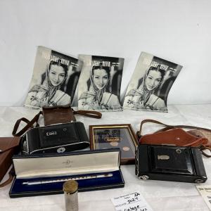 Photo of Antique Cameras, cases, 1951 coins, Thermometer