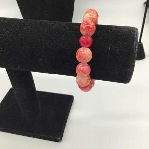 Photo of Light pink, hot pink and yellow beaded bracelet