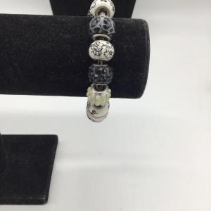 Photo of Chain and black and white fashion bracelet