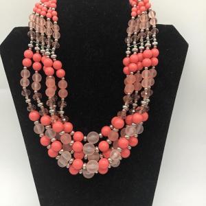 Photo of Bulky pink and peach colored necklace