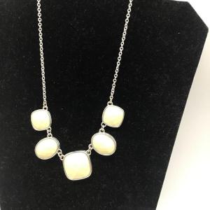Photo of LC creme colored necklace