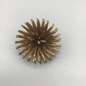 Photo of Gold flower pin